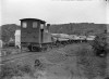 1912_Kauri_Timber_Companys_timber_train_at_Waipapa_laden_with_logs-1912._CMS